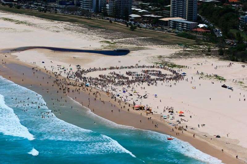 The battle now turns to listing the 38km strip from South Stradbroke to Coolangatta to be declared as a World Surfing Reserve. Marking a statement at Sunday's rally. Photo by Simon Williams